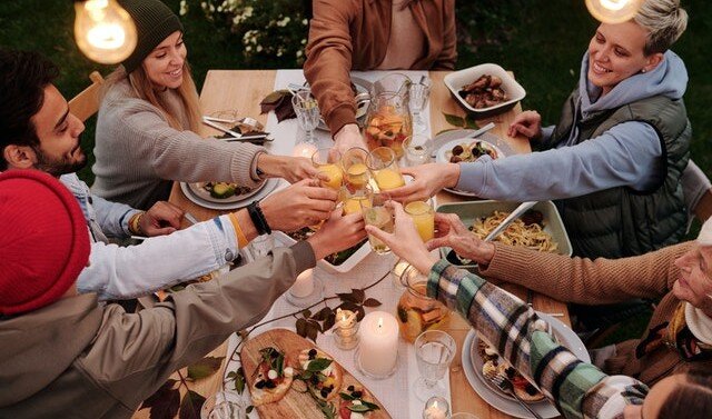 family toasting a the table